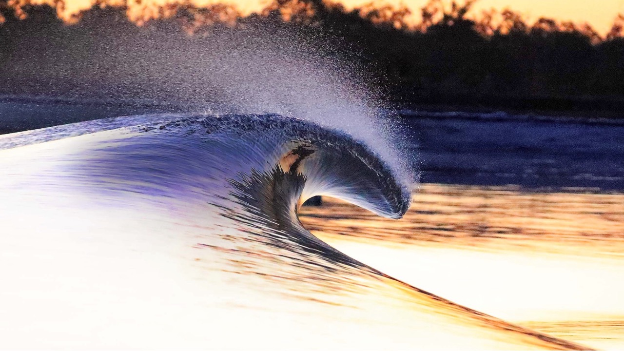 A wave breaks at a Surf Lakes wave pool facility, the same wave technology planned for Pasco County's Peak Surf Park